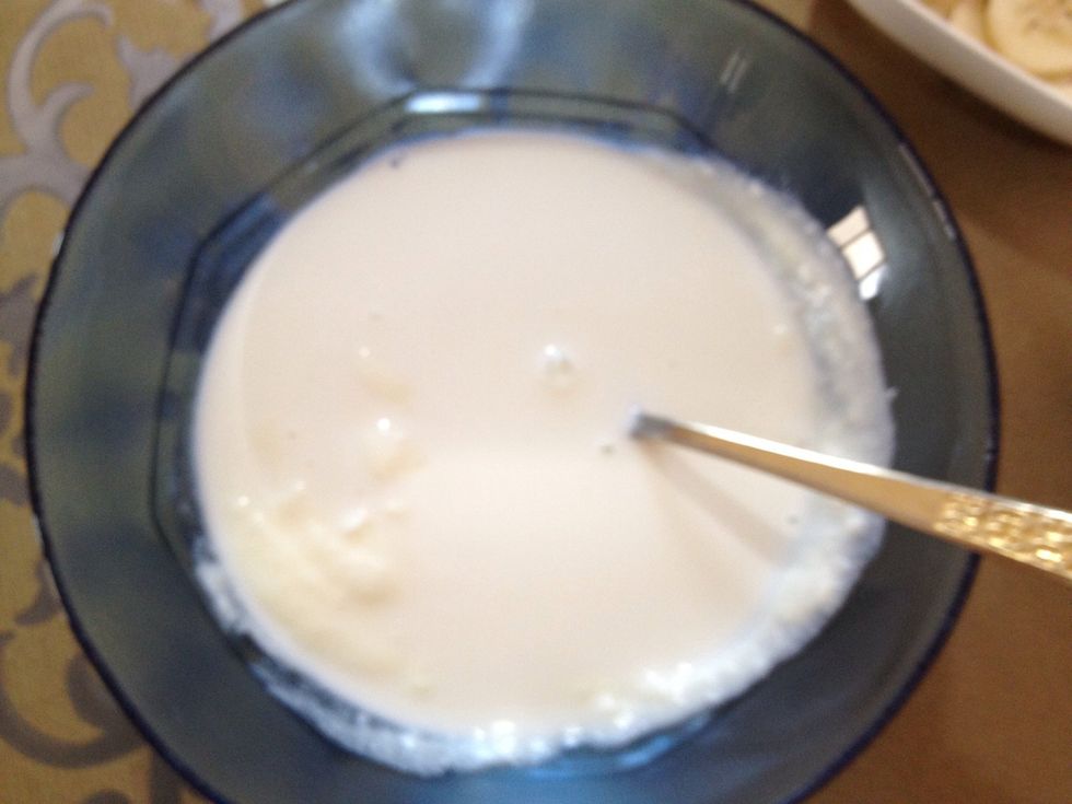 Add in the milk and stir till it's completely mixed with the yogurt.