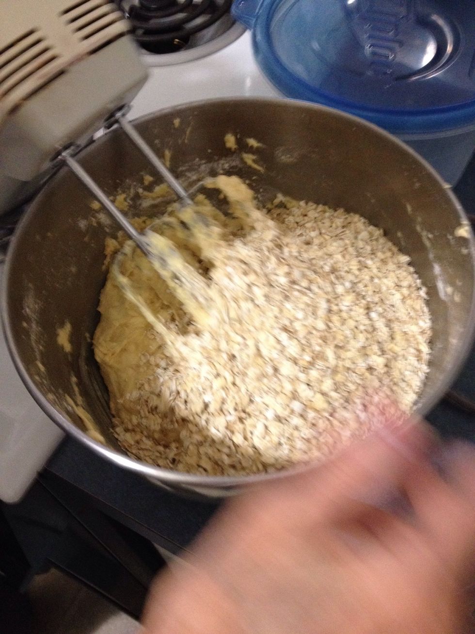 Add In the oats and chocolate chips an mix by hand