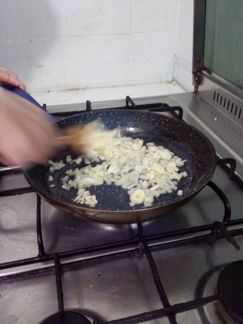 Add in the onion to the pan and stir. Saut\u00e9ed the onion for about 2-3 minutes.