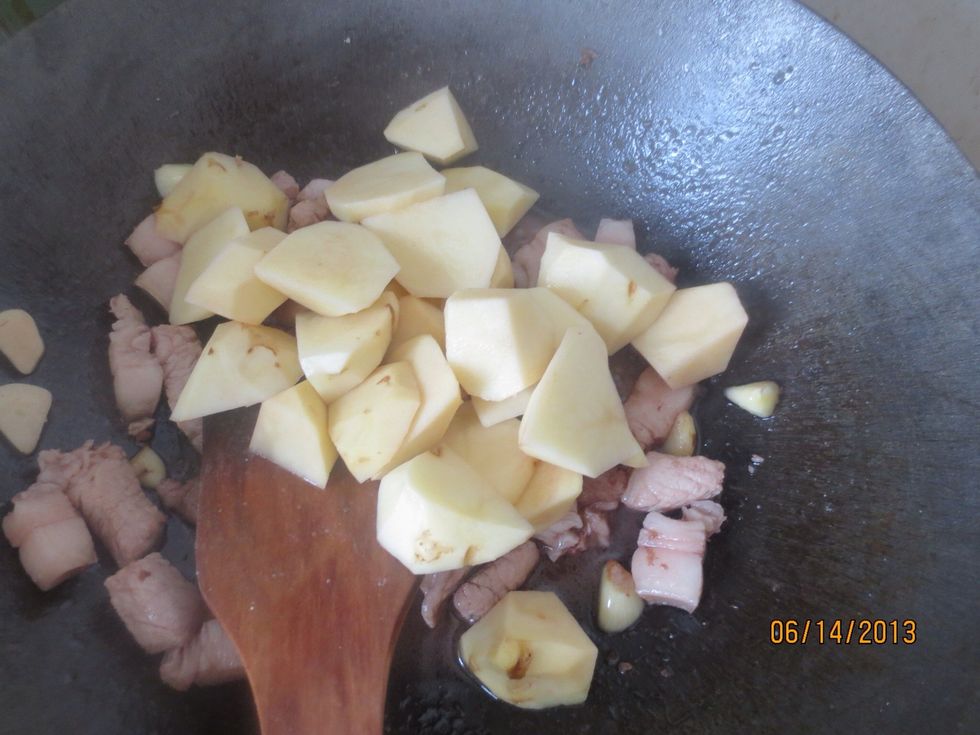 Add in the potatoes