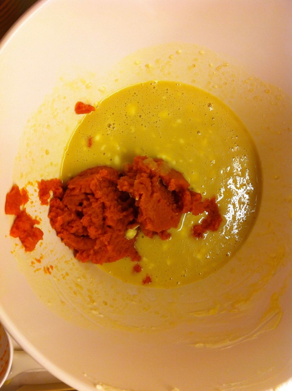 Add in the pumpkin puree and mix