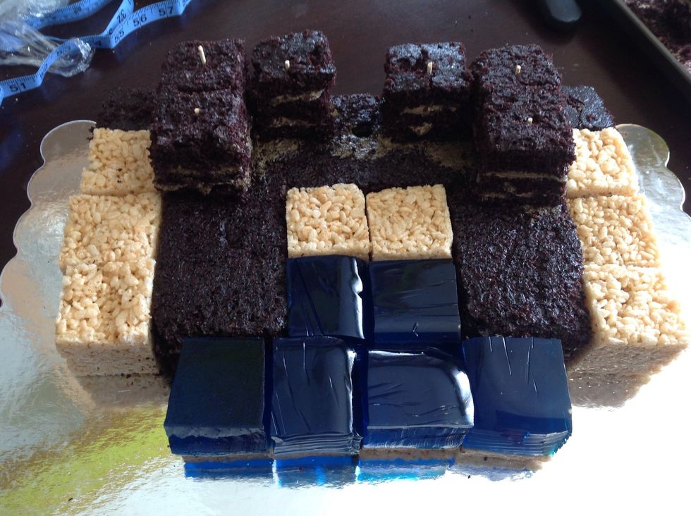 Add in the Rice Krispies for the sand and the jello for the water