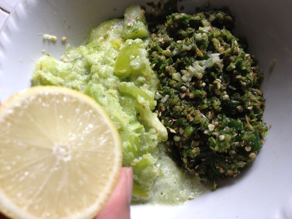 Add in the roughly mashed green tomatoes into the green chilies mixture. Add in half of lemon/ lime juice. The juice is to keep the green color longer