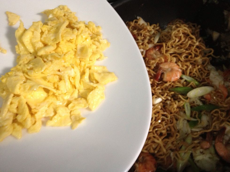 Add in the scramble eggs. Give a stir, turn off the heat