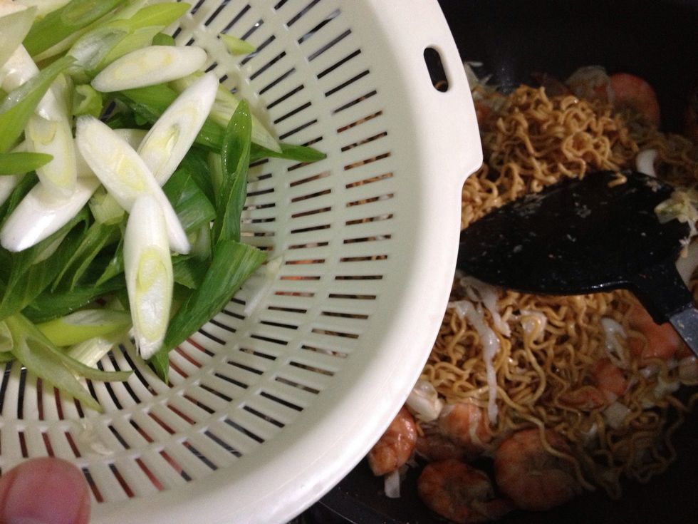 Add in the sliced scallions. Gently Cook for 1 minute