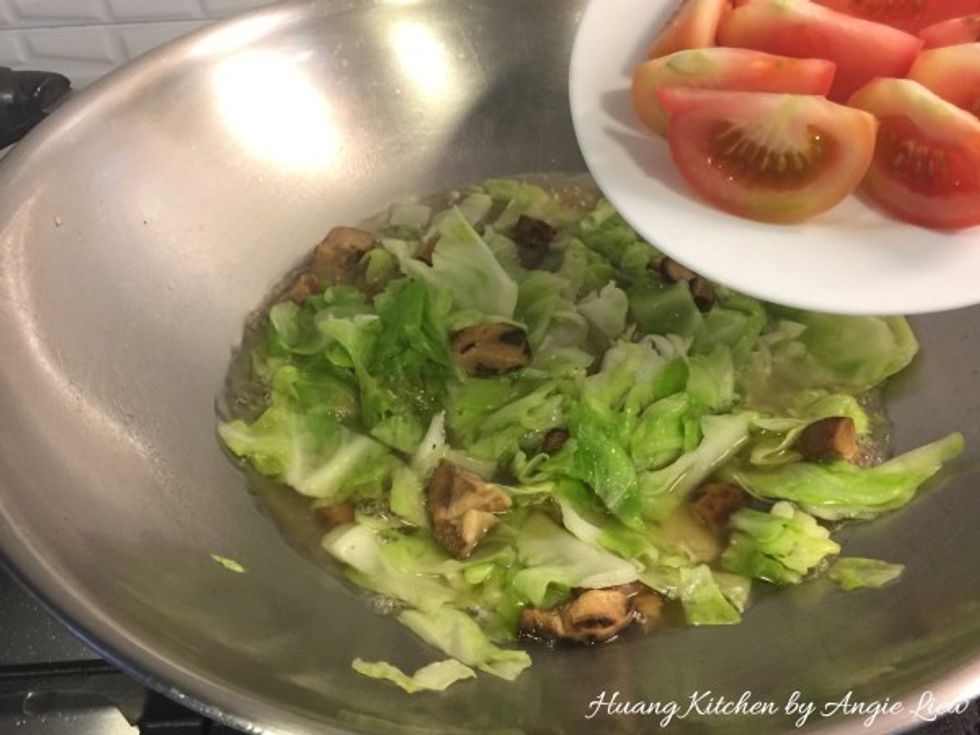 Add in the tomato wedges.