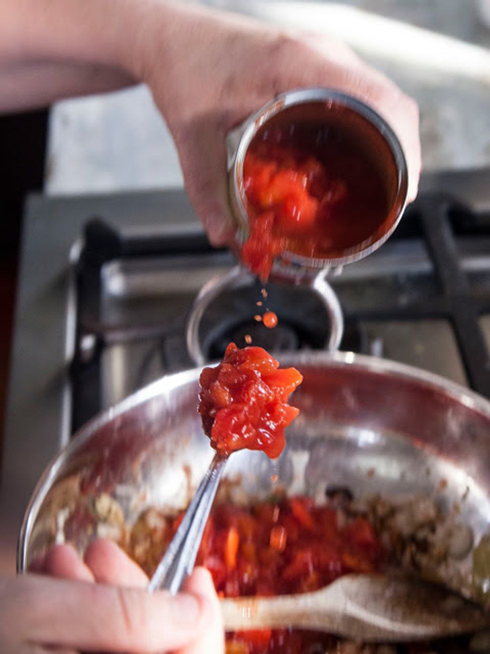 Add in the tomatoes, paprika and nutmeg.