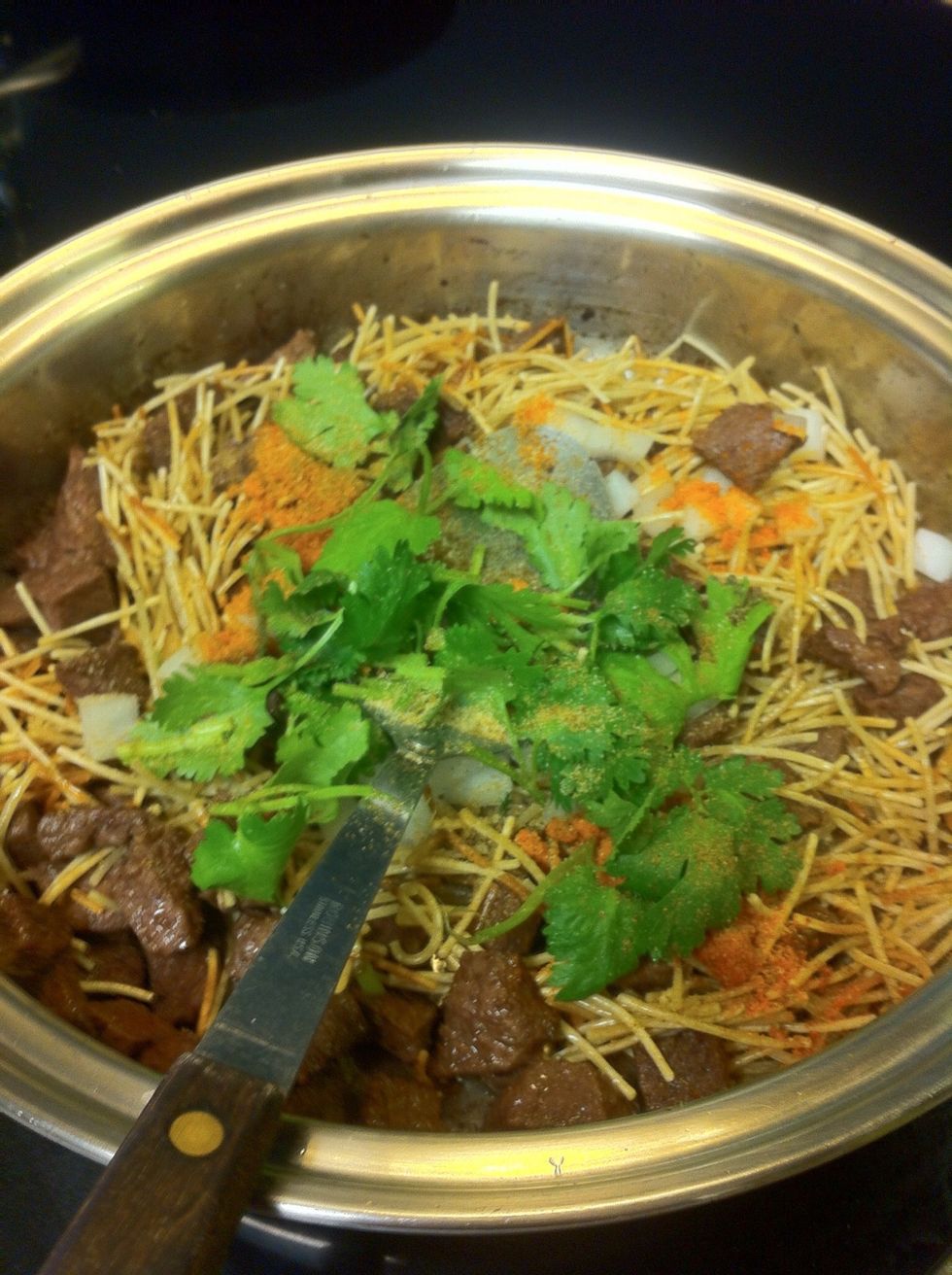 Add in the vermicelli and vegetables.