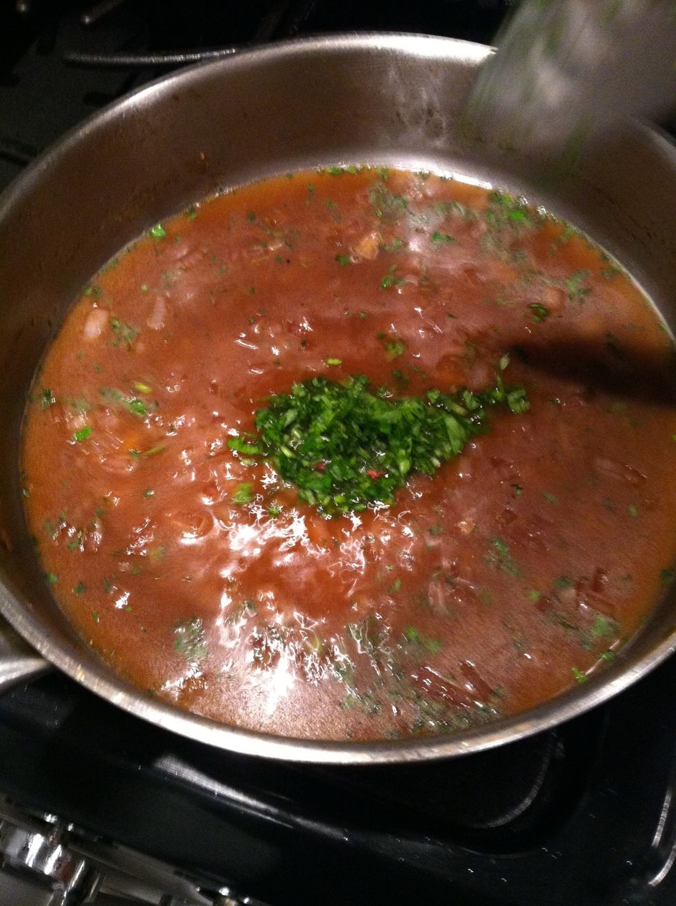 Add in thyme and about half of the parsley