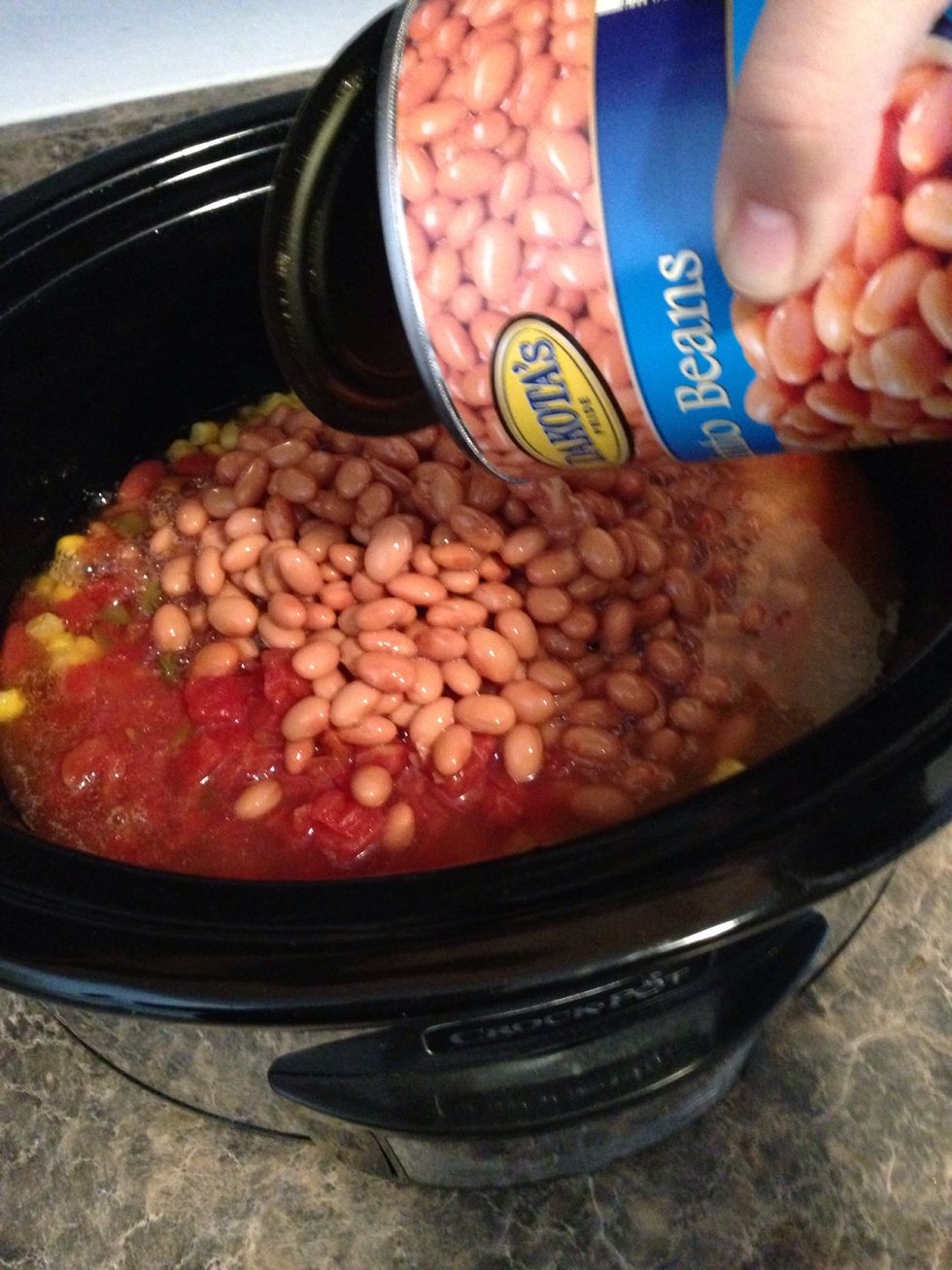 Add in your 15 oz can of pinto beans. The smallest can I could find was 30oz. I don't mind and like it with the extra beans.