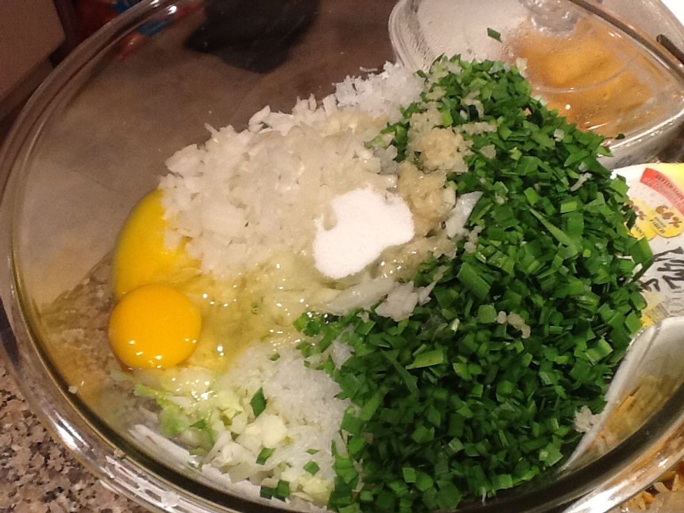 Add in your eggs, shoyu, sesame oil, mirin, sugar, black pepper, and salt.