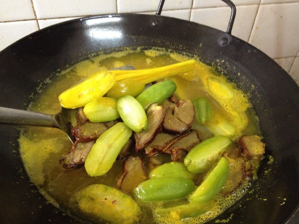 Add in your meat, belimbing buluh in. U can sub with 2 calamansi lime juice or 1/4 lemon juice. If u want to add vege, zuchinni will be good. Simmer for 7-10mins. Add about 1-2tsp salt to taste