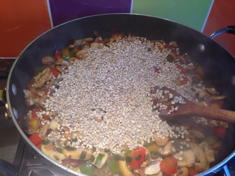 Add in your pearl barley and stir to coat in the juices