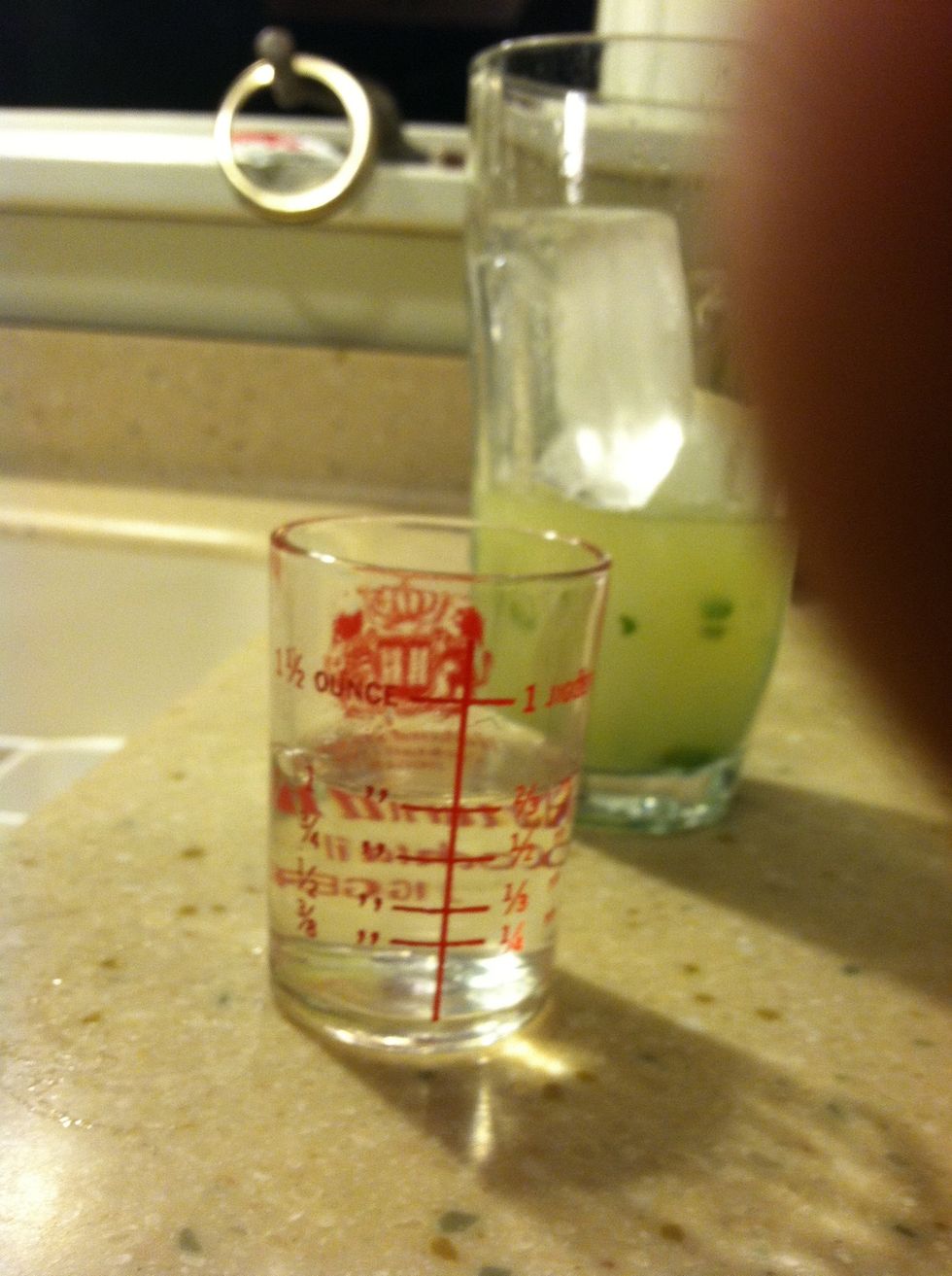 Add in your rum. I'm using clear Bacardi rum here.