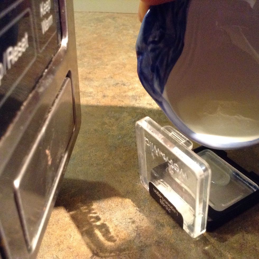 Add into your container be careful  you may want to use oven mitts it's very hot