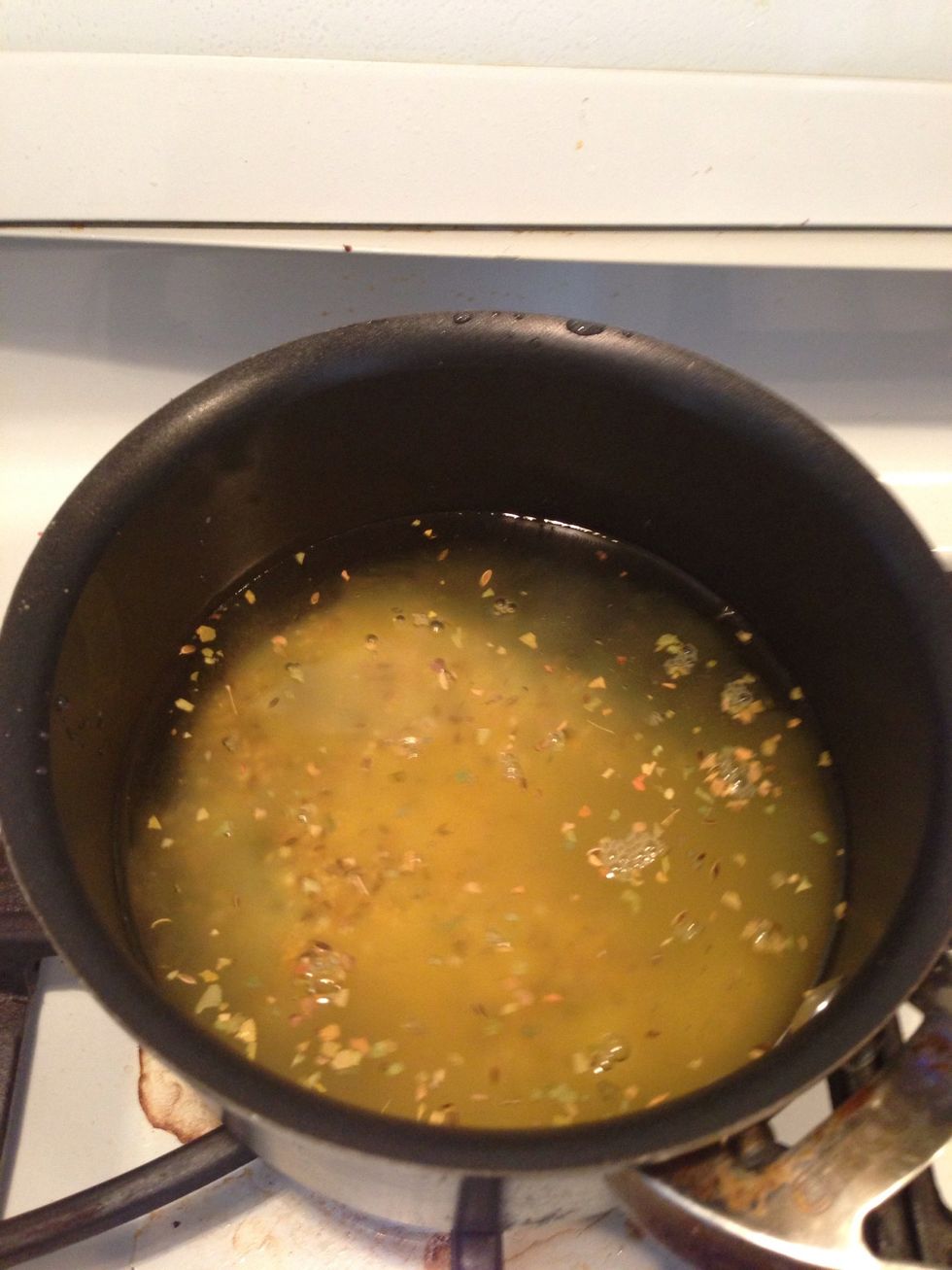 Add it all to a medium pot and put on high heat.