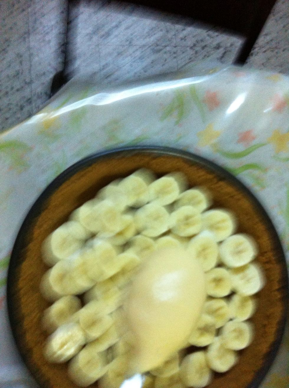Add it on top of the bananas, sorry for the poorly snapped picture