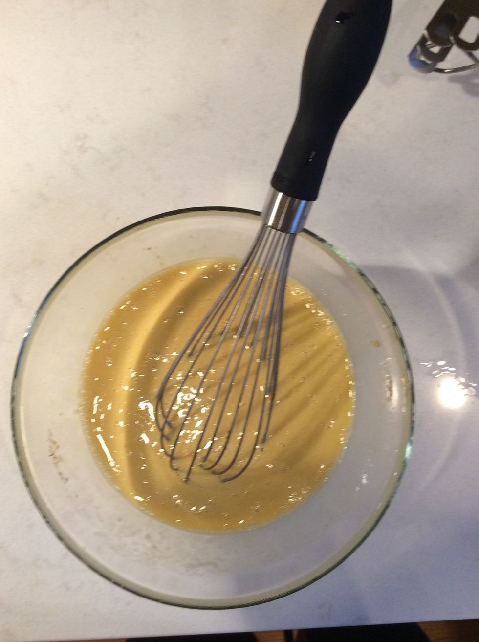 Add it to the eggs and whisk until frothy.
