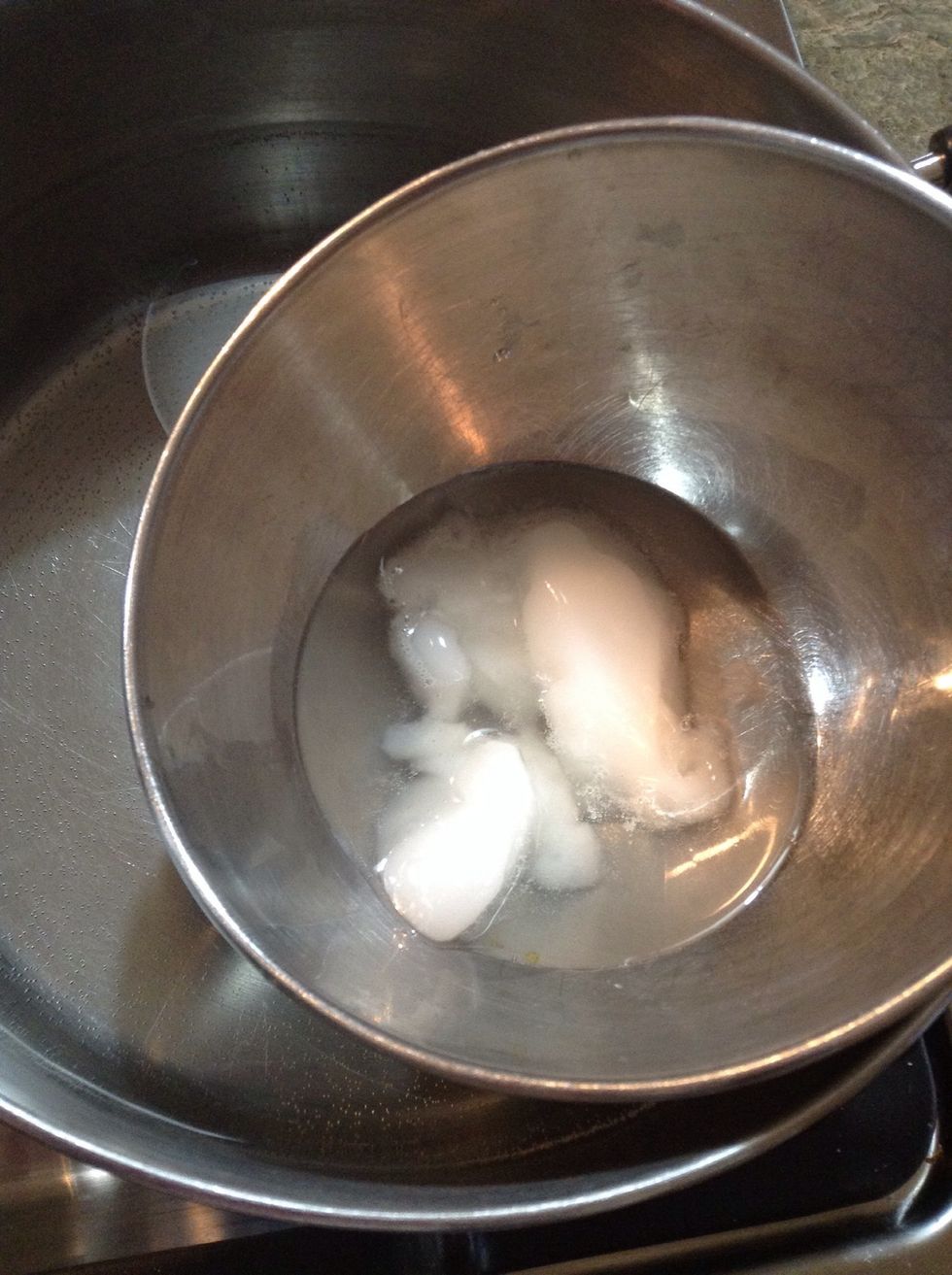 Add it to your pot of hot water it's about half melted