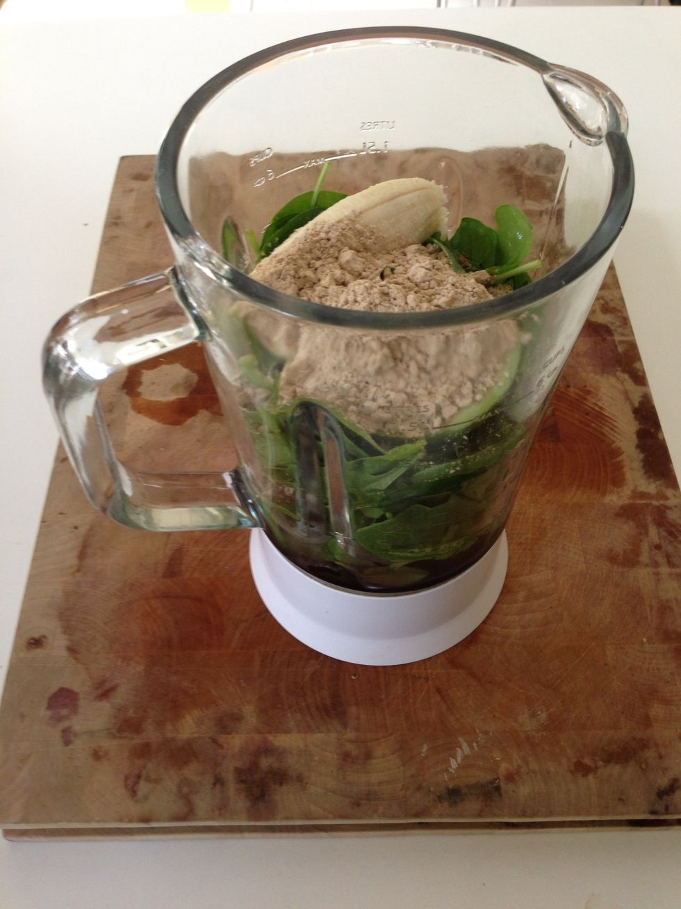 Add items in the following order. 1. Berries 2. Spinach (half). 3. Banana. 4. Avocado. 5. Coconut water. 6. Protein powder.  Blend all for about 60-90 seconds. Add remainder of spinach while blending.