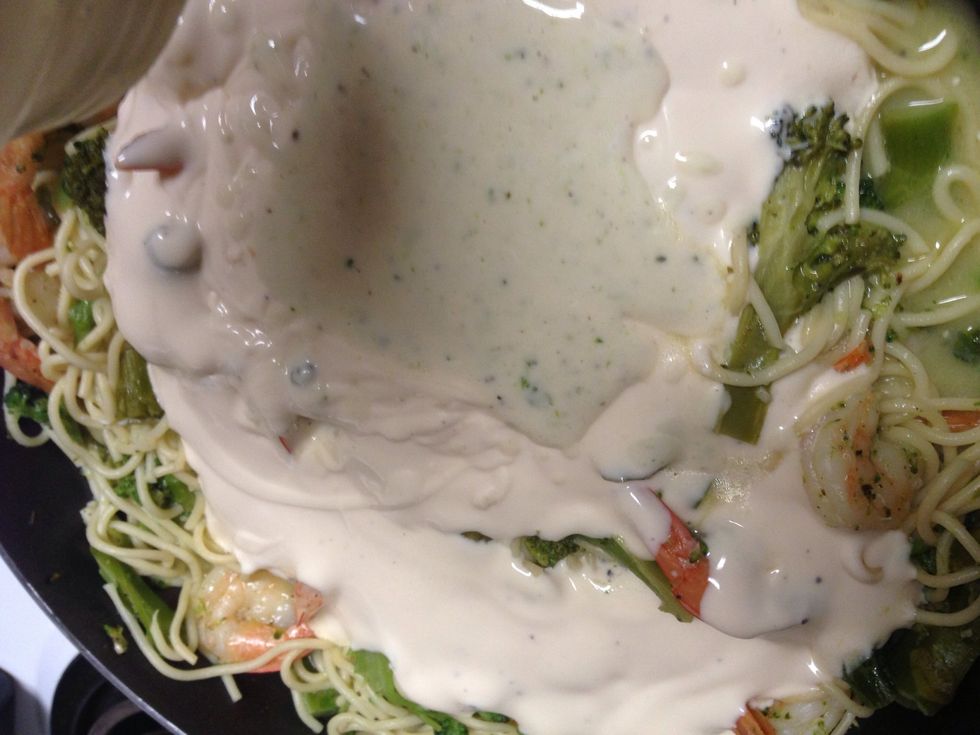 Add jar of Alfredo sauce & mix well. Add additional spices if desired. I added my fave garlic pepper seasoning.