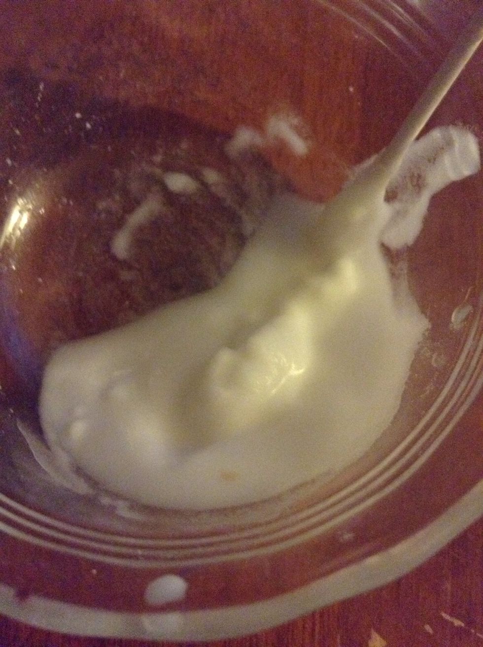 Add just a bit of water to it. You want it a little thicket then this, I added a bit more baking soda to this. Mix it up into a paste.