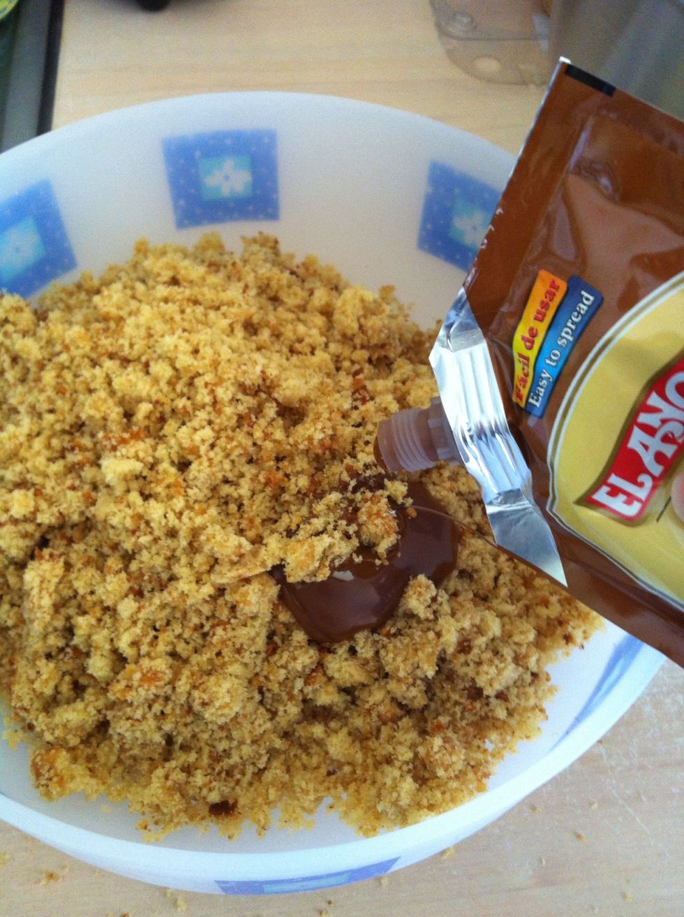 Add just a little frosting at a time and mix in with your hands