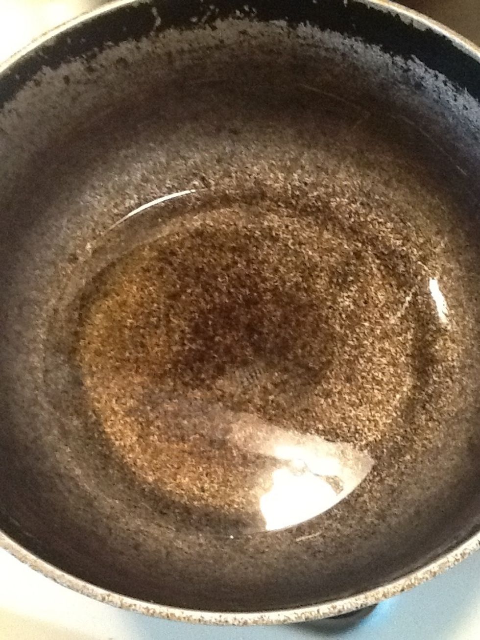 Add just enough oil to cover the bottom of the pot. We want to brown the meatballs not deep fry them.