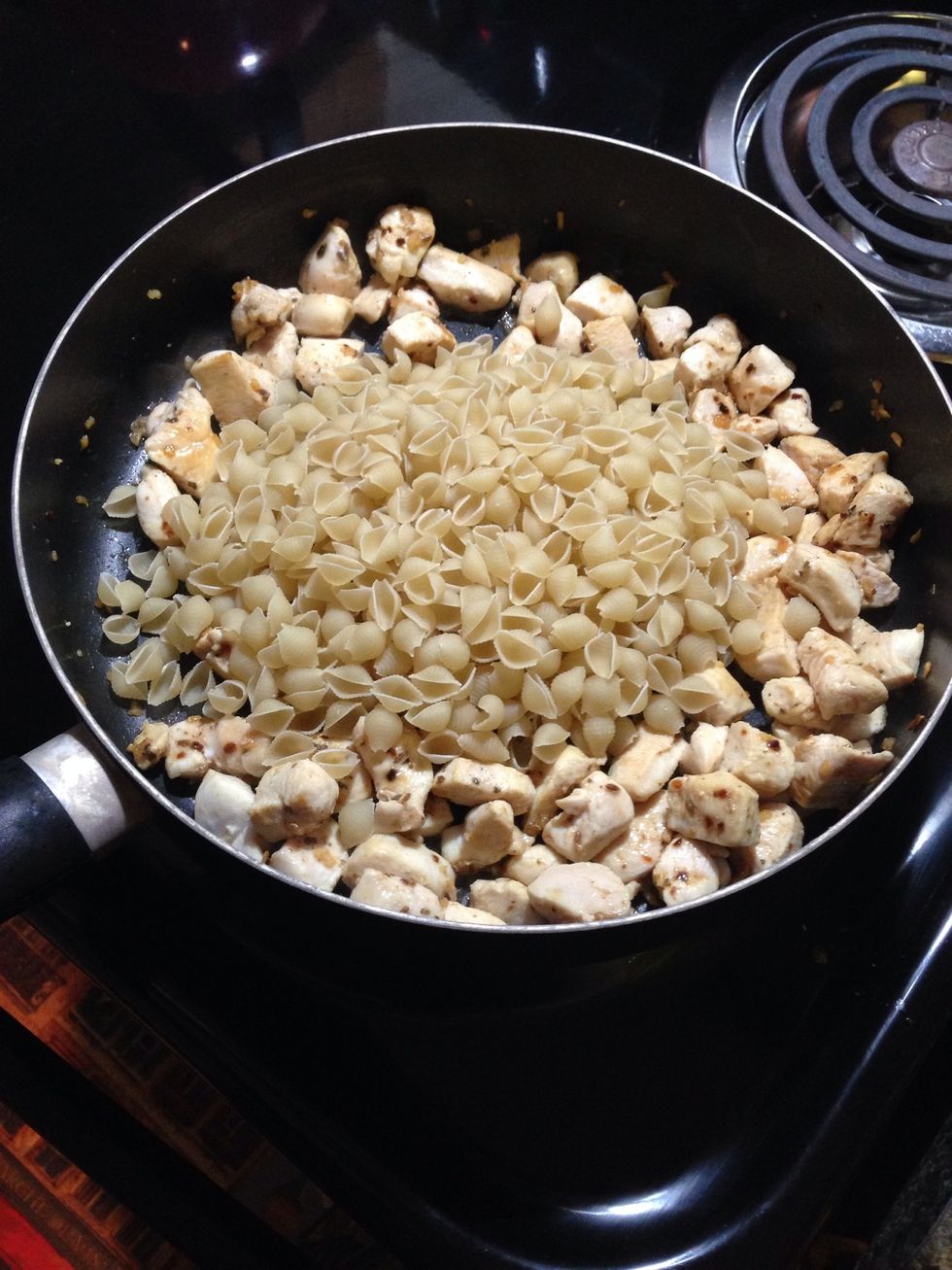 Add just the shells to the pan. I let them cook for a minute.
