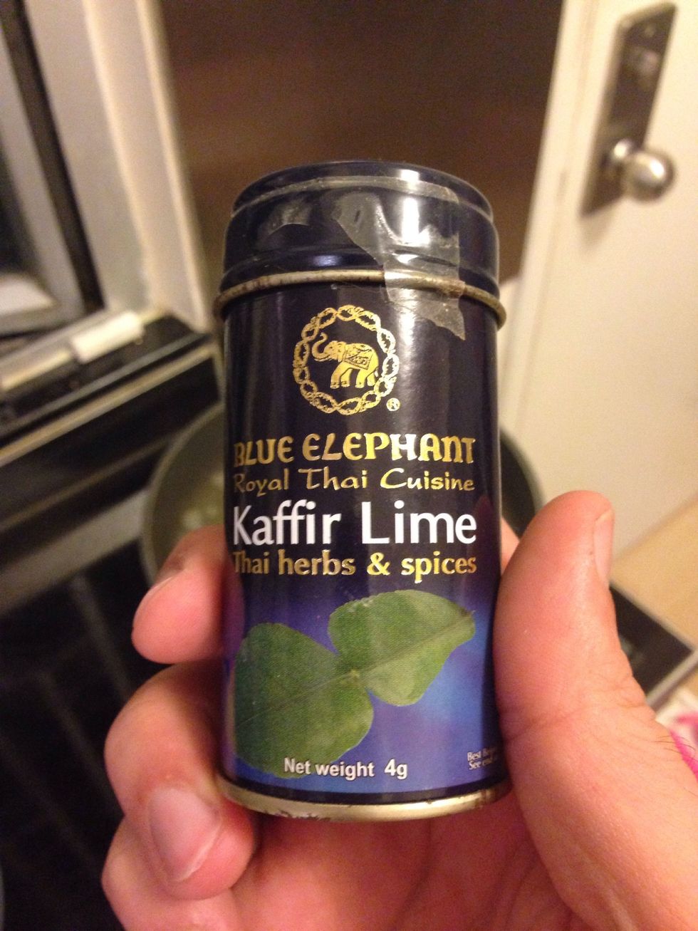 Add kaffir lime leaves. If fresh, remove the tough central stalk first