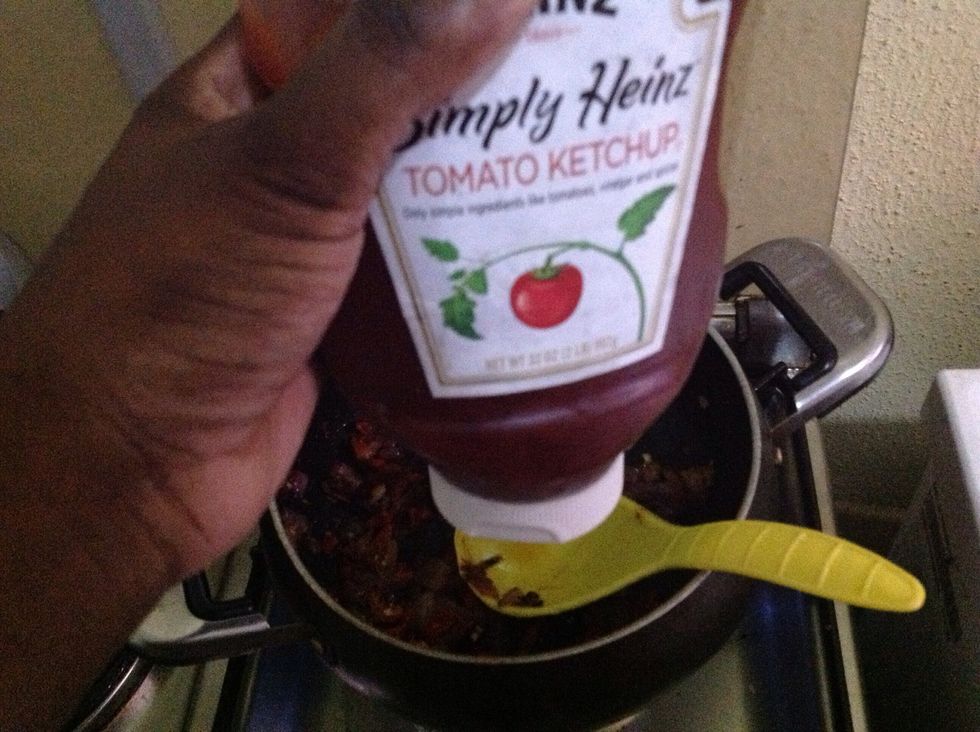 Add ketchup and tomato pur\u00e9e to saut\u00e9ed onion and pepper