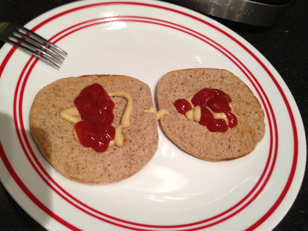 Add ketchup/mustard to buns