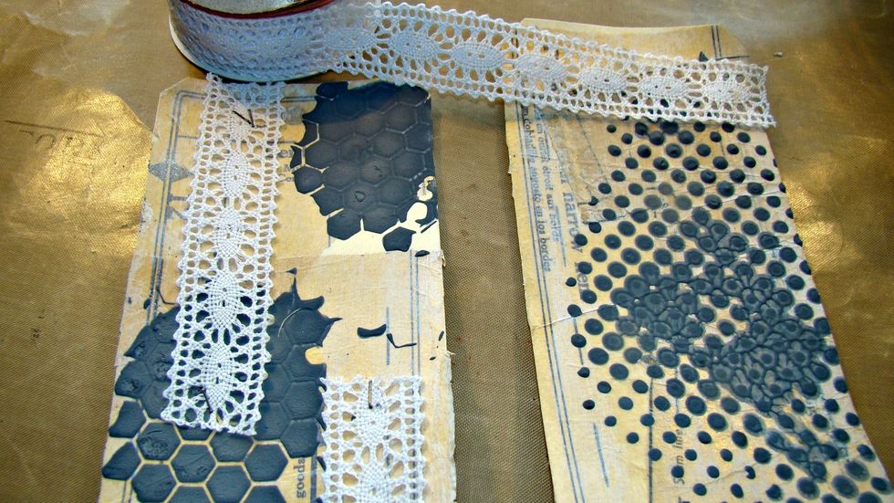 Add lace randomly in spots. I just stapled them using T!m Holtz's Tiny Attacher for this.