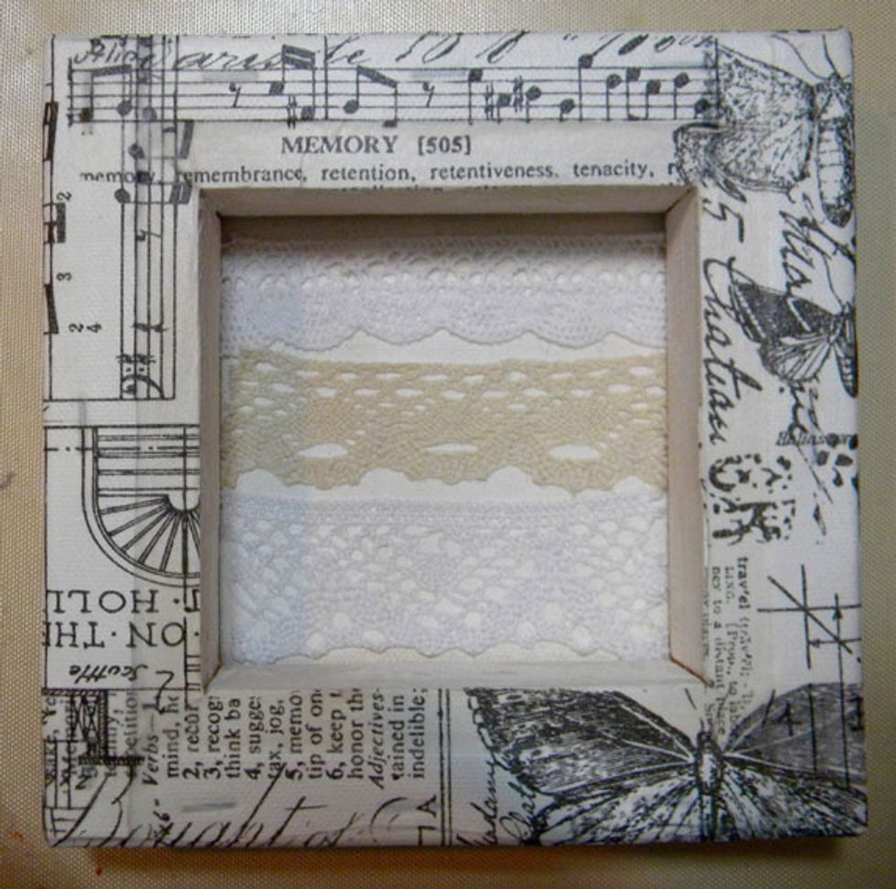 Add lace to the background using matte medium.