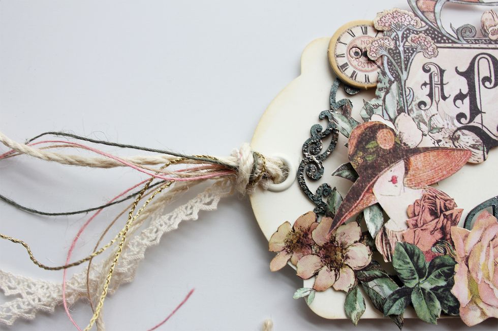 Add lace, twine and jute to the opening as shown.