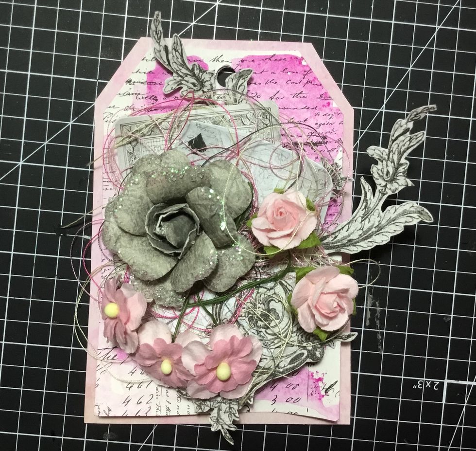 Add larger grey flower as shown.