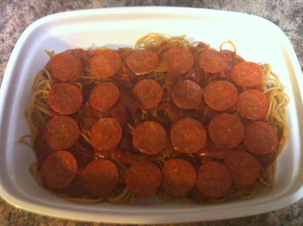 Add layer of pepperoni. You can also add other toppings in this layer. I imagine some onion or mushrooms, even some sausage may be quite tasty