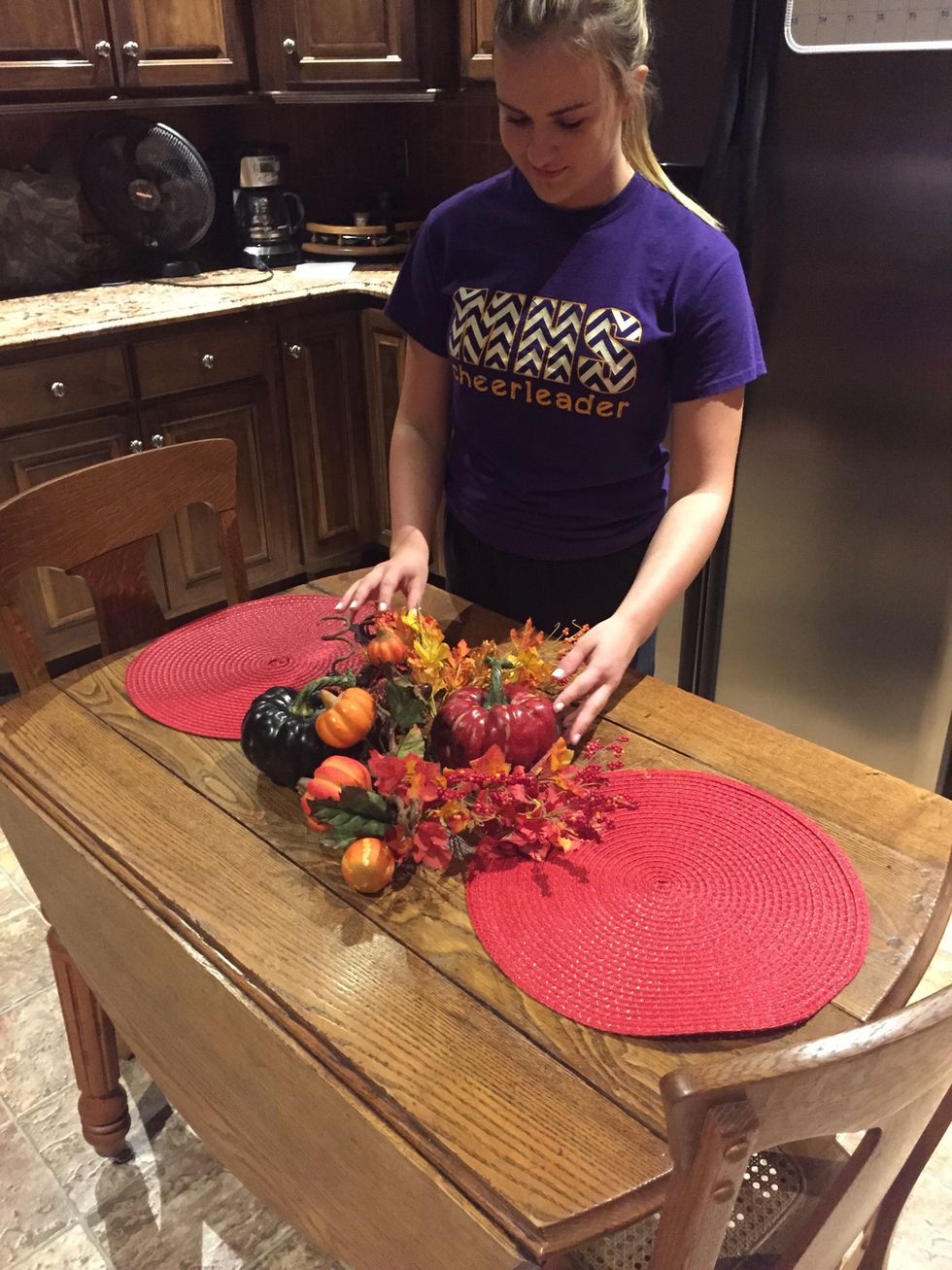 Add leave decor around the pumpkins