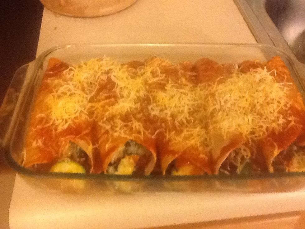 Add left over enchilada sauce and cheese on top. It's ready for getting baked ;)