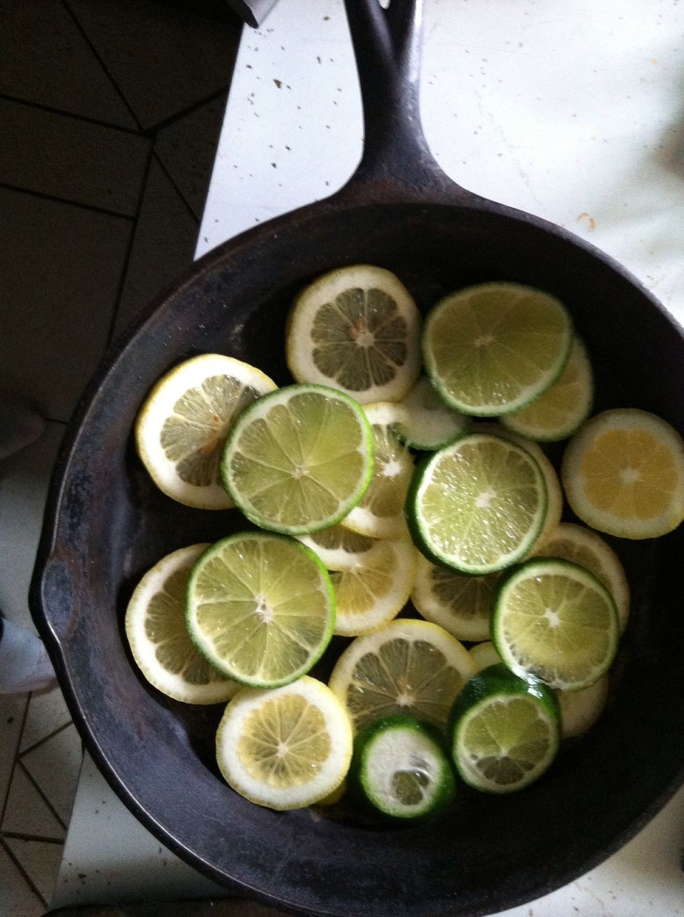 Add lemon and lime slices. Add steak, the season and flavor to your liking.