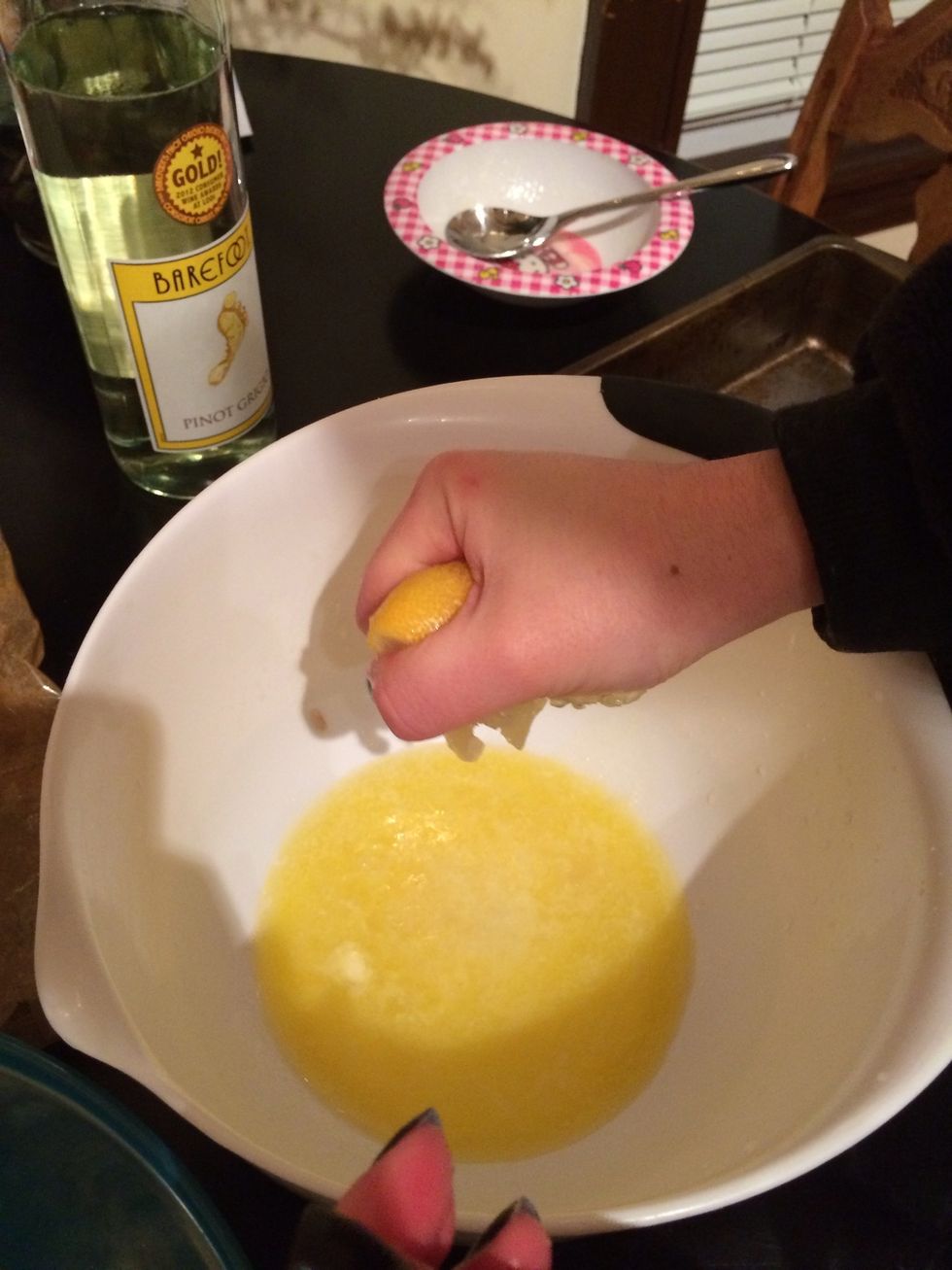 Add lemon and wine to the butter and mix together