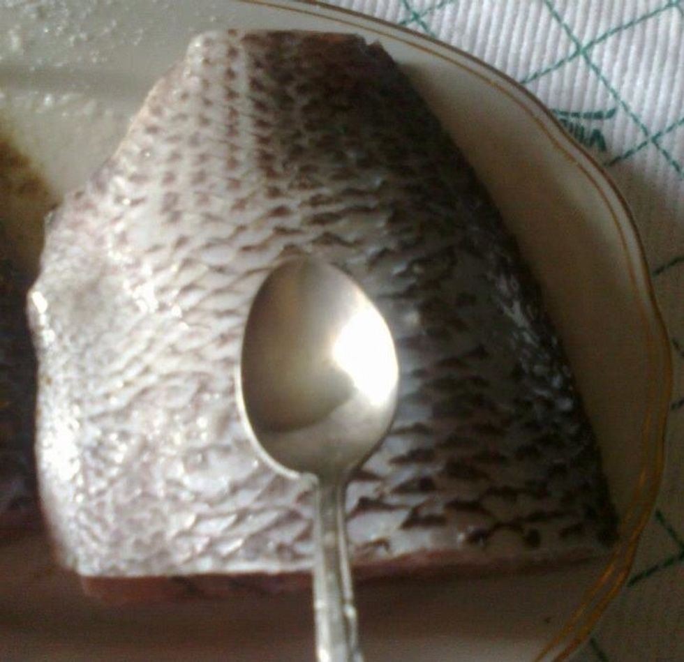 Add lemon juice and distributed it to the fish