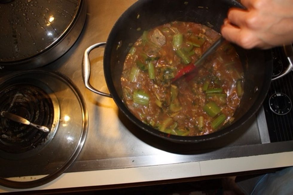 Add lemon juice, three cups of water and celery to beef. Place lid on pan and cook on medium heat for one hour. Stir occasionally and add a cup more water if needed.