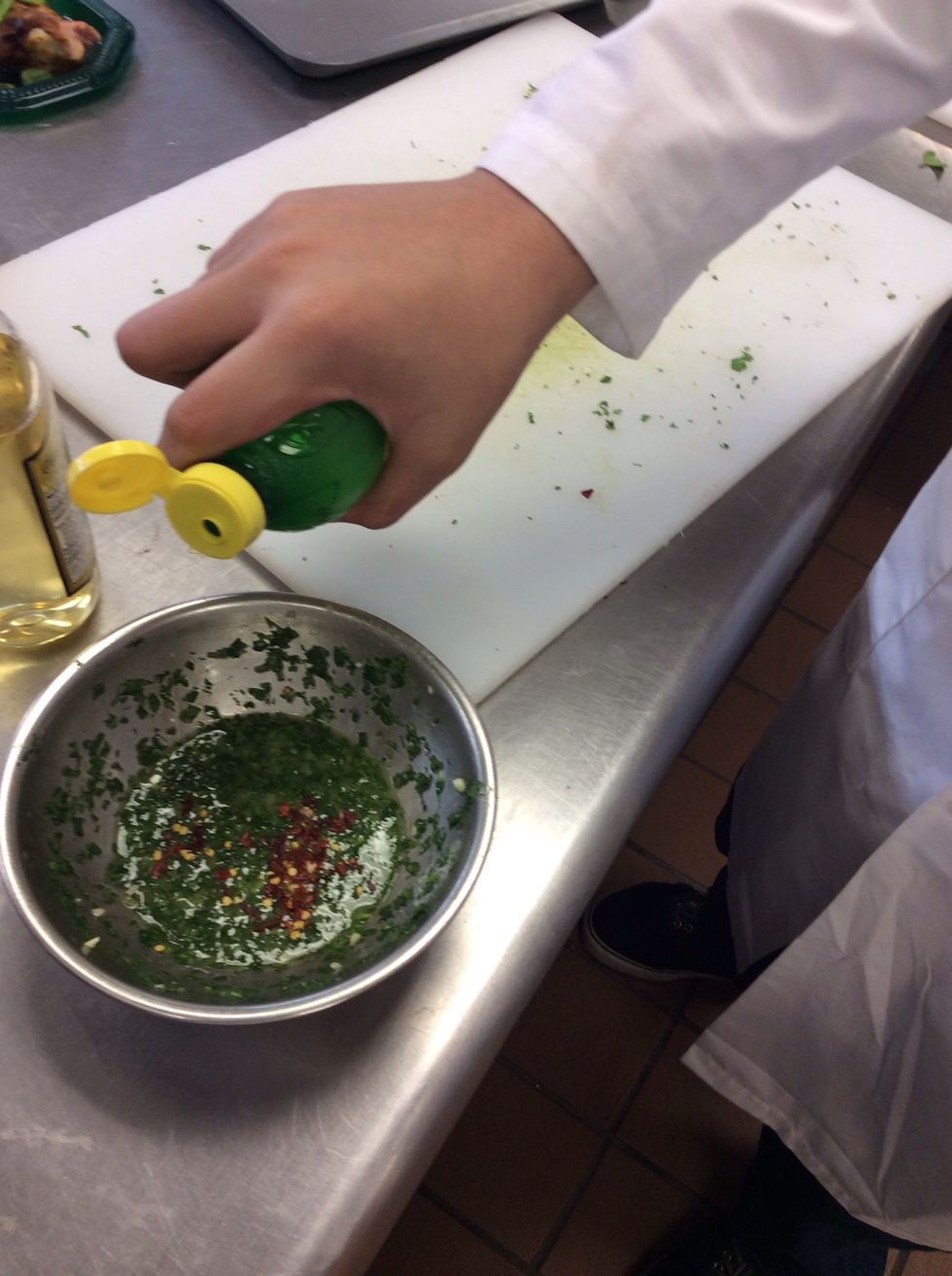 Add lemon juice to cilantro and parsley