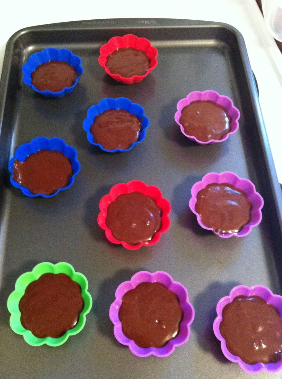 Add lemon juice/vinegar in the batter and then spoon the batter to the muffin liners in the baking tray.