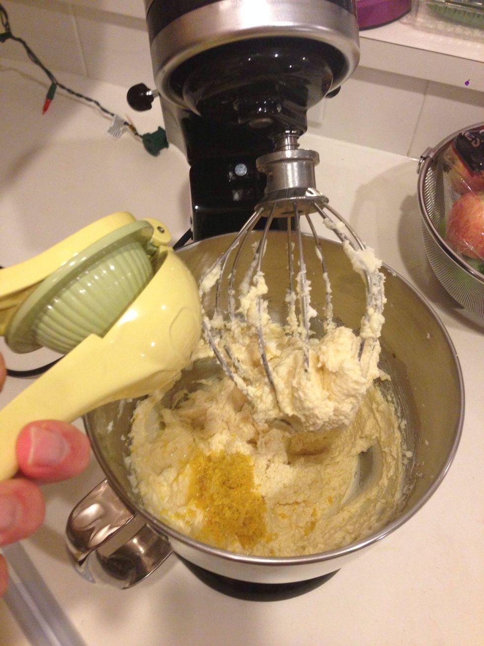Add lemon zest and lemon juice. This will make your fluffy butter mixture look curdled. Don't worry about it. Mix for about 1 min.
