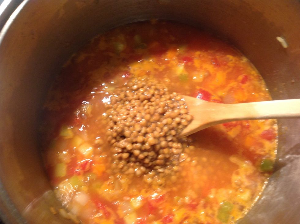 Add lentils to soup. Cook for 5 minutes or until heated through. Ladle soup into bowls. Sprinkle with parsley and squeeze lemon juice.