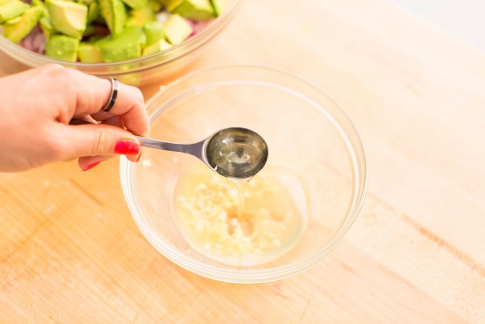 Add lime juice and olive oil to a separate small bowl.