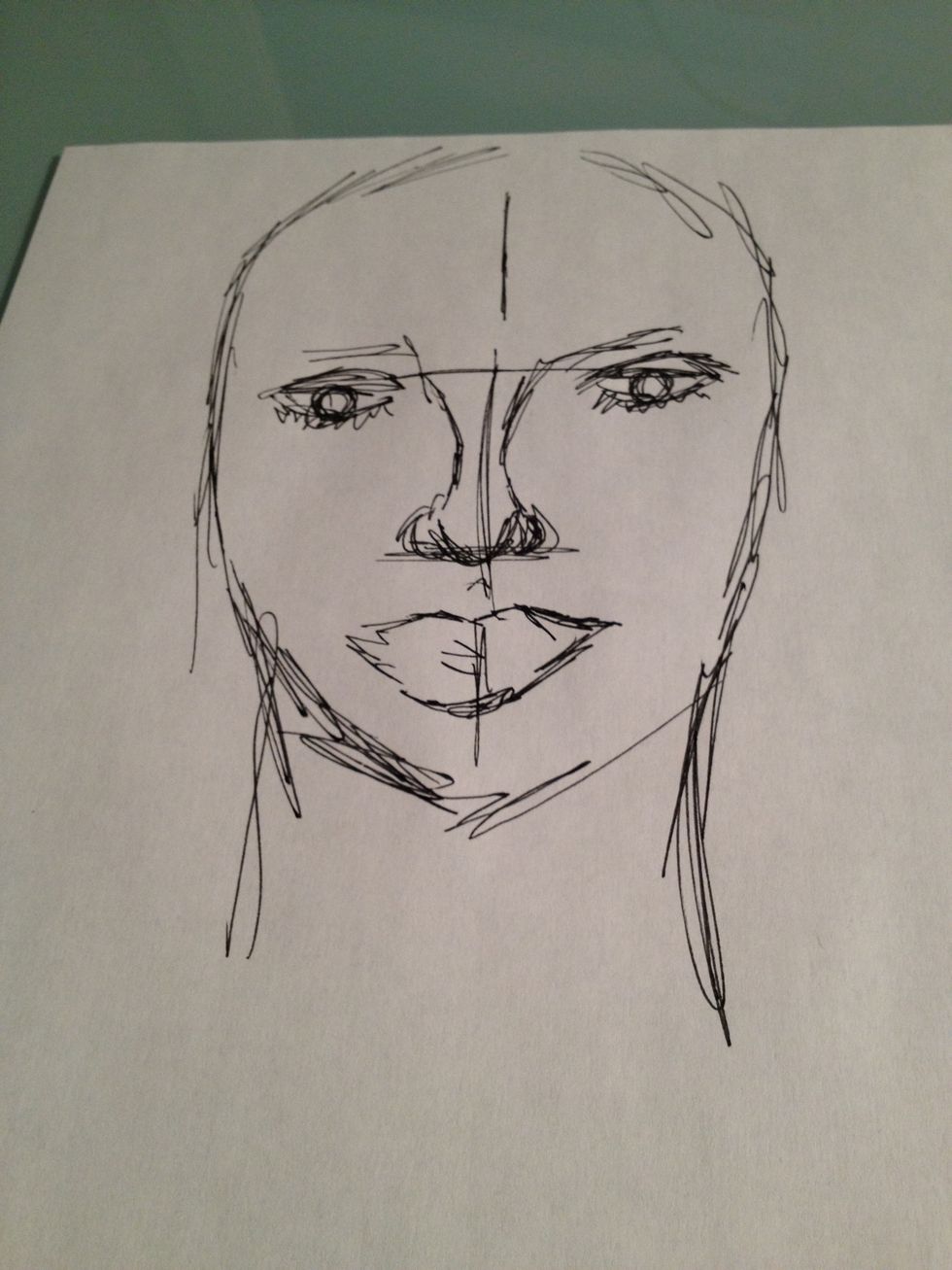 Add lips about an inch below nose tip and add neck curving inward