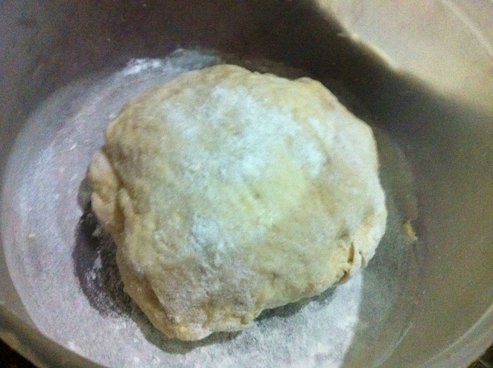 add little bit flour over it and around it so that it wont stick